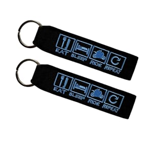 Nyckelring Eat Sleep Ride Repeat Blå